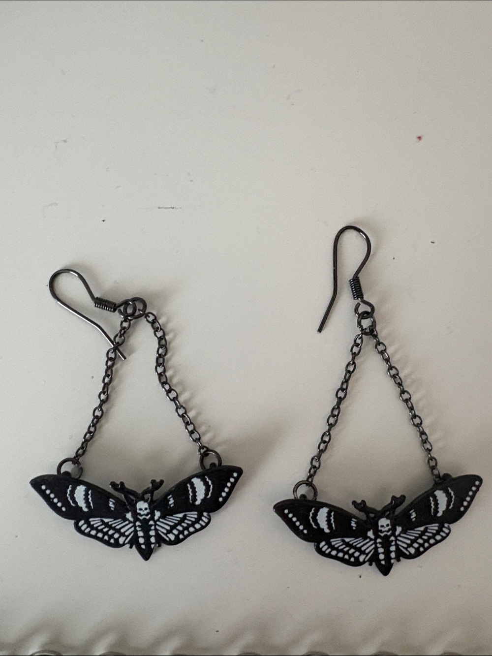 2010s Hot Topic skull moth earrings - worn once